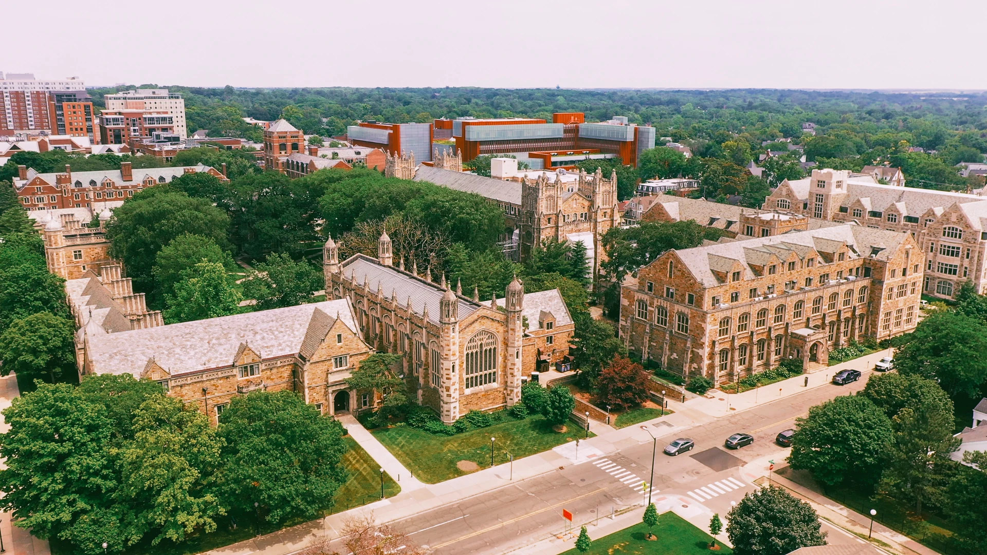 Aerial view of the University of Michigan campus and tree-lined streets in Ann Arbor