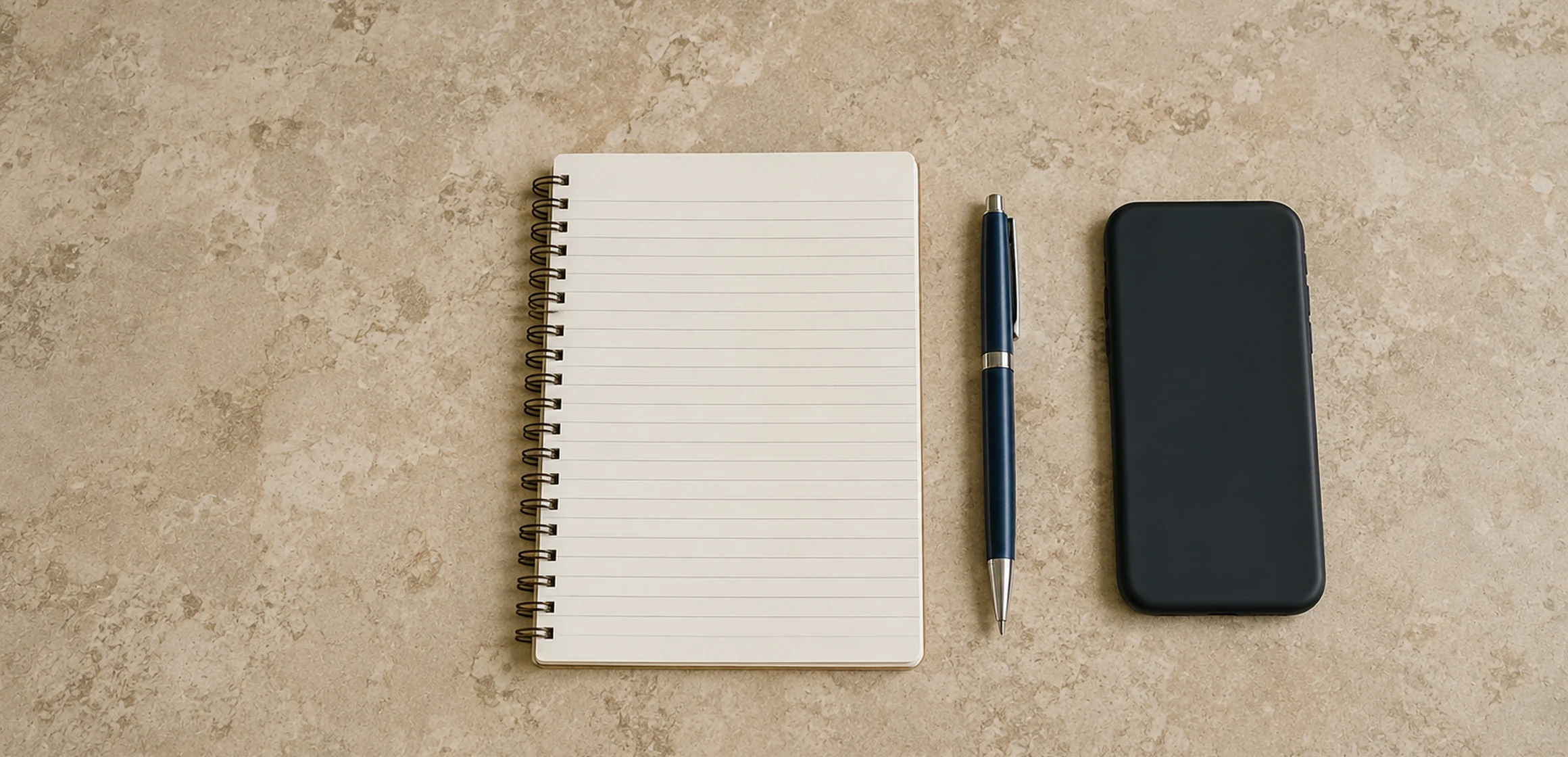 A calculator and paperwork on a desk in a Washtenaw County home